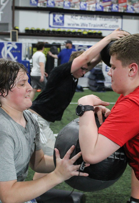 Kansas City Athlete Training Offensive Line Football Academy Group Classes and Private 1 on 1 Lessons for youth, middle school and high school football players looking to improve and gain confidence becoming a better offensive lineman whether it is Center, Guard, or Tackle on the football field with fundamentals being taught at the WeTrainKC Indoor Facility in Kansas City Missouri